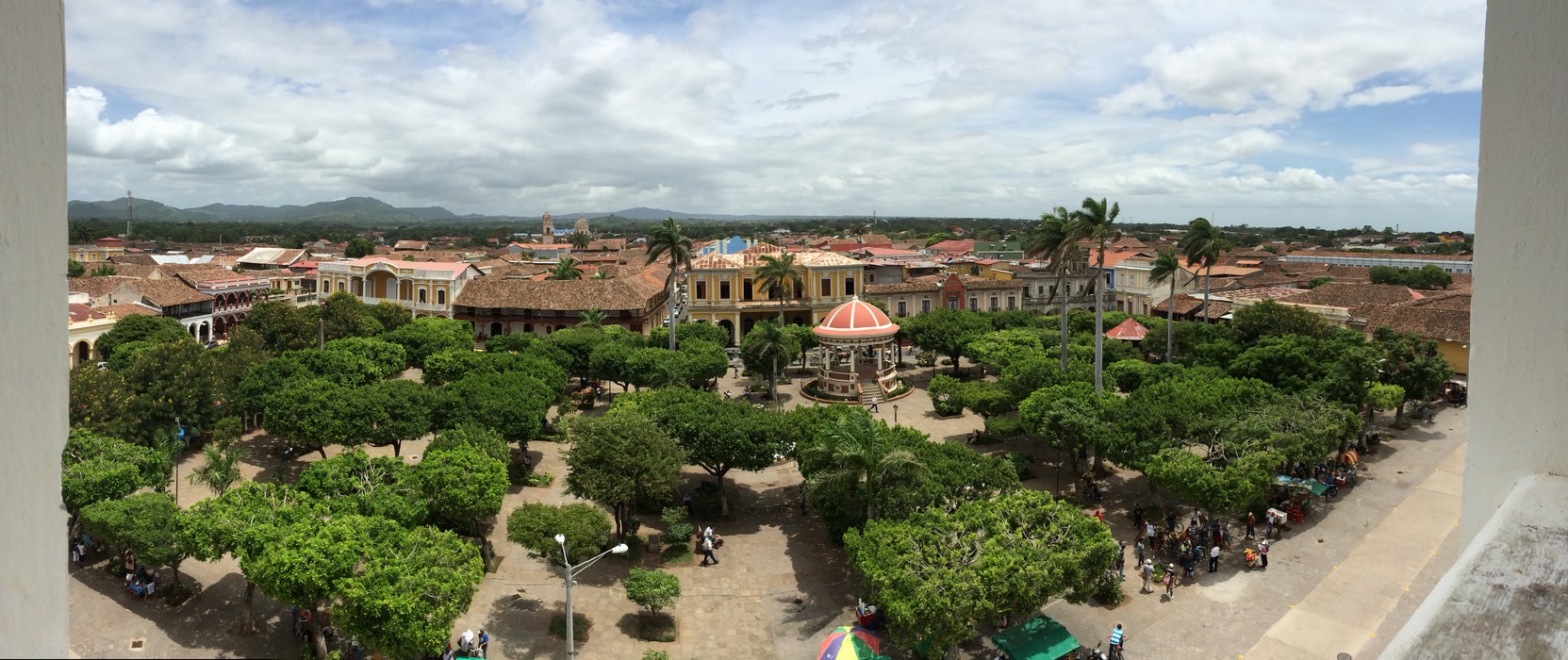 View of the main square in Granada and Christopher Columbus Park from the Bell Tower of Catedral de Granada
