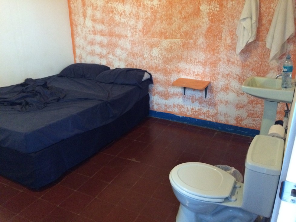 The owner of the hostel called this the Prison Room! For $30/night, I'll take it. There was a shared bath with shower right next to our room as well. We haven't slept in more than a sheet since we left Guate City. It's too hot for anything else. 