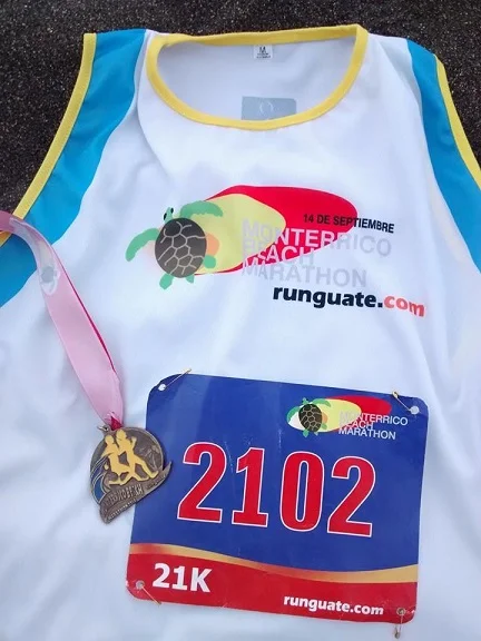 Shirt, bib and medal from my first half marathon in Guatemala