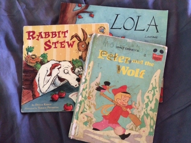 I knew Tag would love these books when I found them in the used book store. Ken has read Rabbit Stew at least 30 times this summer. Tag is now reading Peter and the Wolf to himself. Guns, wolf hunting...of course Tag would love the book, no matter how much the book had already been loved by another. 