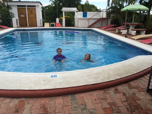 I think they took off their flip flops before they got in the pool but I'm not positive. 