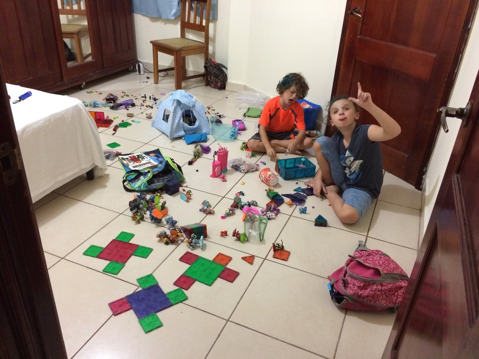 This picture is taken from the bathroom and the door leads to the comfy couch. The rooms are large in size, which the kids enjoy. They love to spread out their toys and play for hours at a time. The rule is that they must make a walking path at night time. Typically, they set up right in front of the door. I no longer apologize when I open the door on their butts!