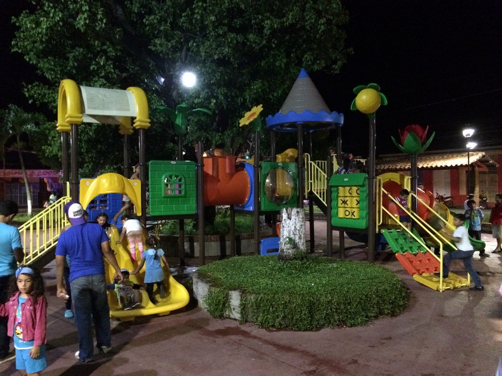 The playground! It's not unusual for Ela and Tag to join other children playing tag and other games at the park. 