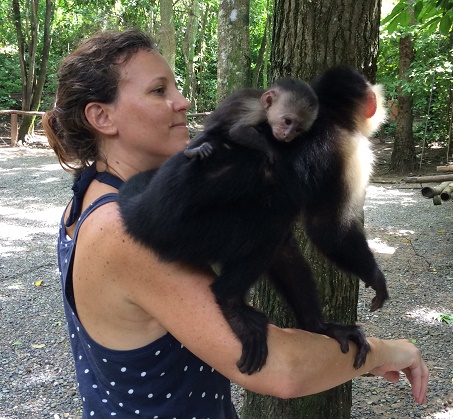 This mama monkey and her baby hung out on my shoulders and arm for at least 10 minutes. At one point, the baby's face was 2 inches from mine. 