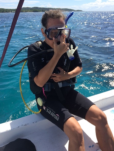 The backwards roll is one of the safest ways to enter the water from a boat. It was also a bit freaky the first few times. Ela never did do it. 