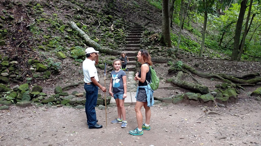 Raul, giving the family a brief overview of the ruins.