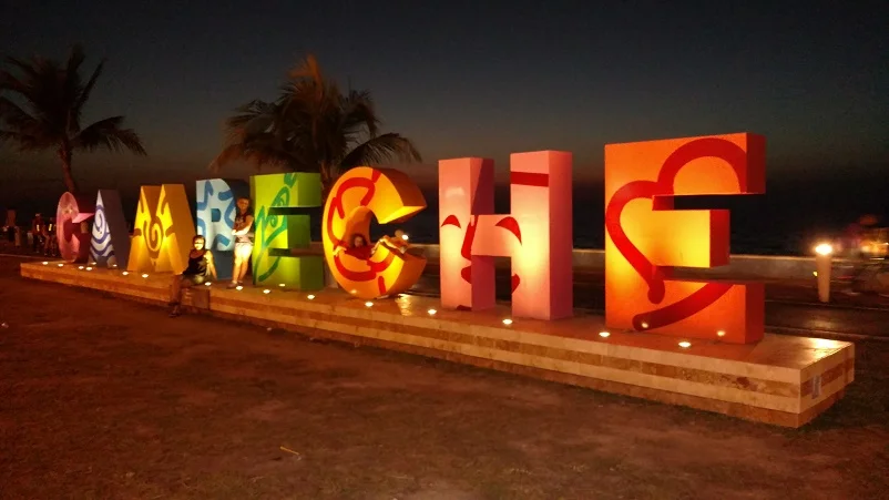 The best part of the malecon -- taking pictures on this cute sign. Can you find three of us?