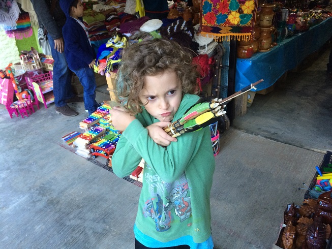 This was the WORST toy. It's a bow and arrow. I shot it once and burned the side of my finger. Then, I went to shoot it again and I broke the bow. I told Tag daddy would fix it another day, before hiding it. 