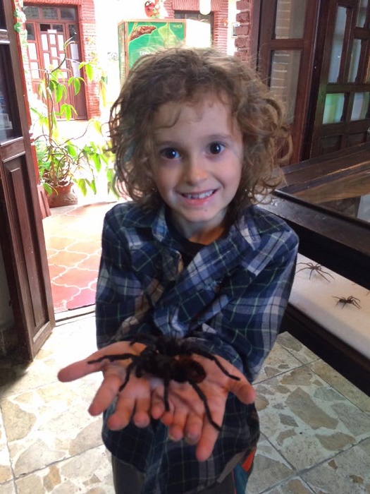 Tag and his furry friend, the tarantula. Yes, it was alive.
