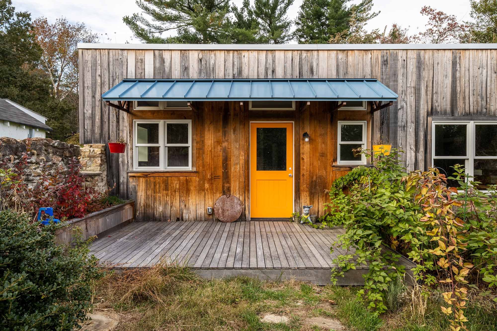  The plan now separates the pigsty into two completely re-imagined apartments, apart from the 1960s pine-paneled kitchen, which was re-used.  Moisture issues throughout were addressed including the grain silo attached to the pigsty, which leaked terr