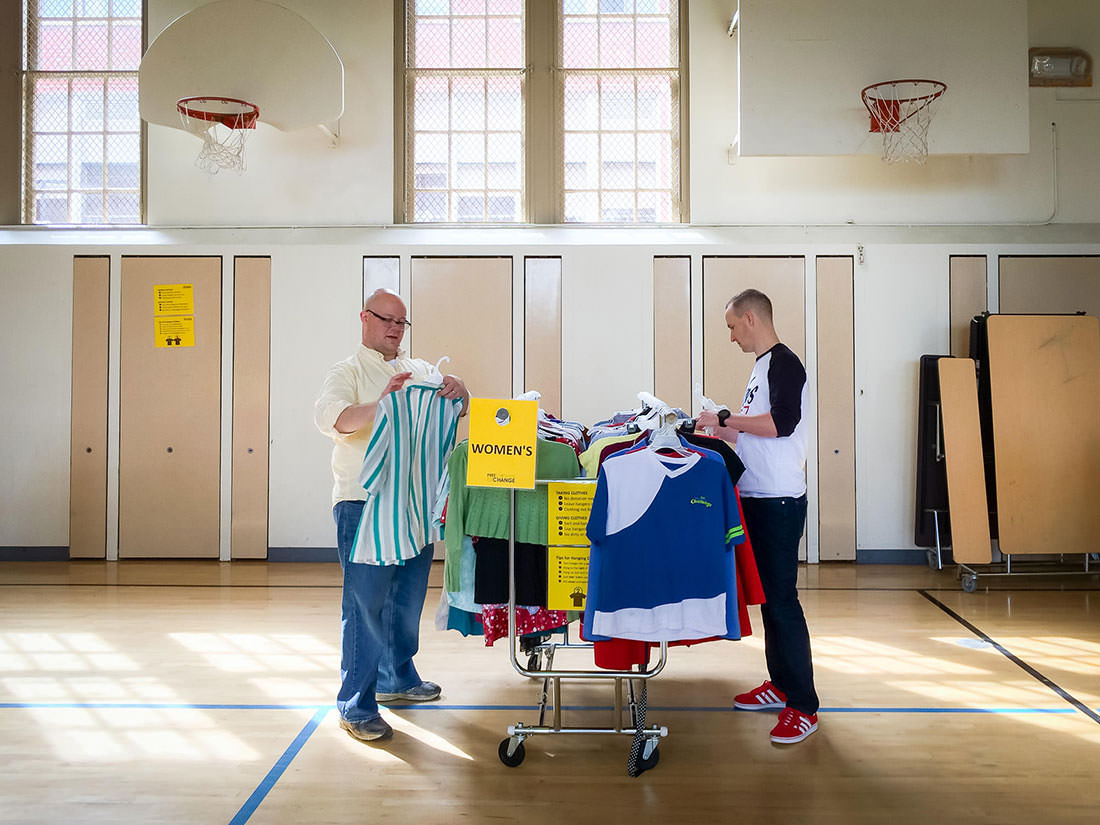 Free Clothing Exchange volunteers, Heath & Steve, help sort and hang clothes before the Spring 2015 Exchange. The Free Clothing Exchange is completely volunteer run. We'd love your help. If you'd like to volunteer let us know at our next Exchange, or drop us a line using the Contact Form on this website.