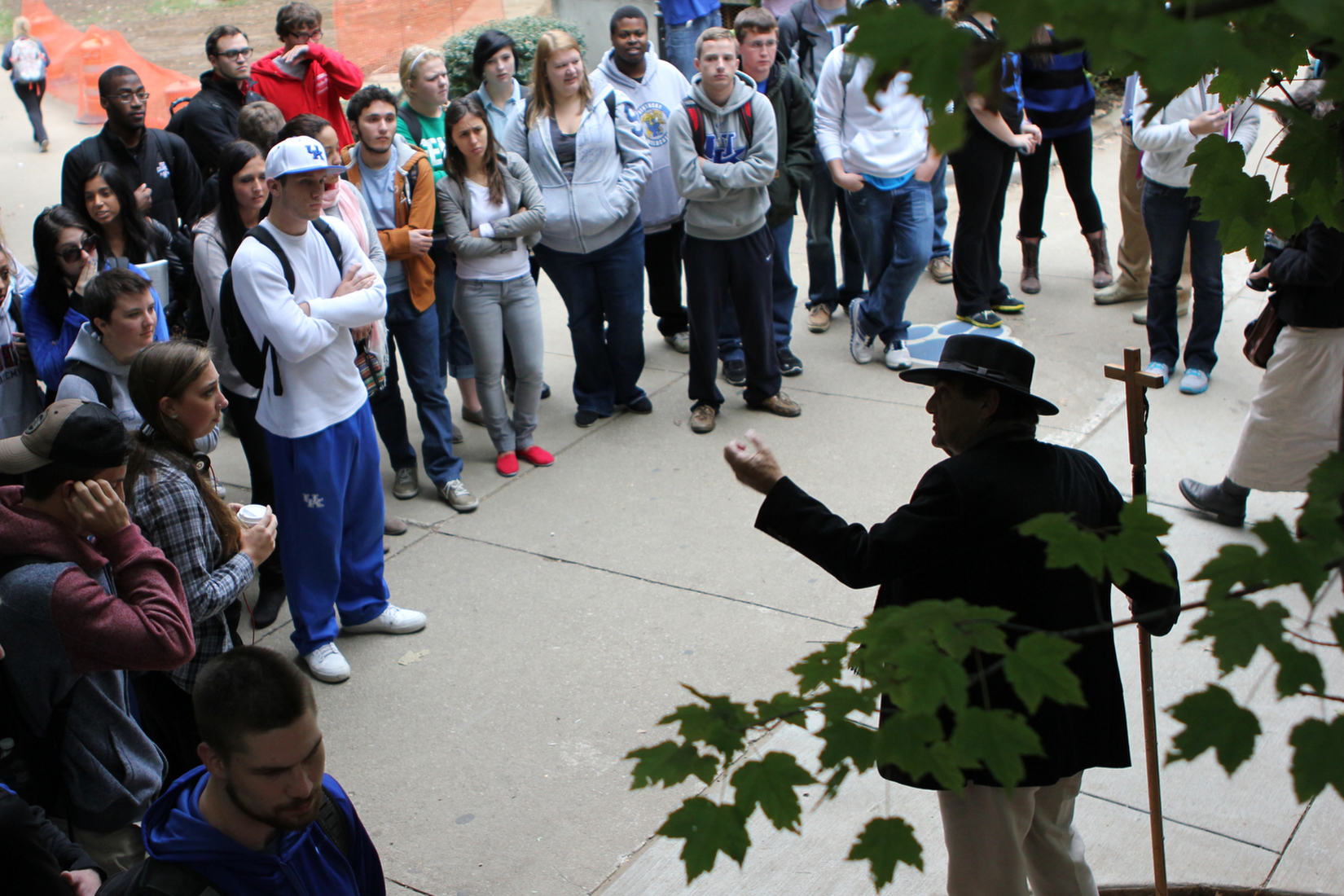  Dozens of students watch on as Brother Jed Smock preaches in the free speech area in front of the University of Kentucky's student center in Lexington, Ky. 