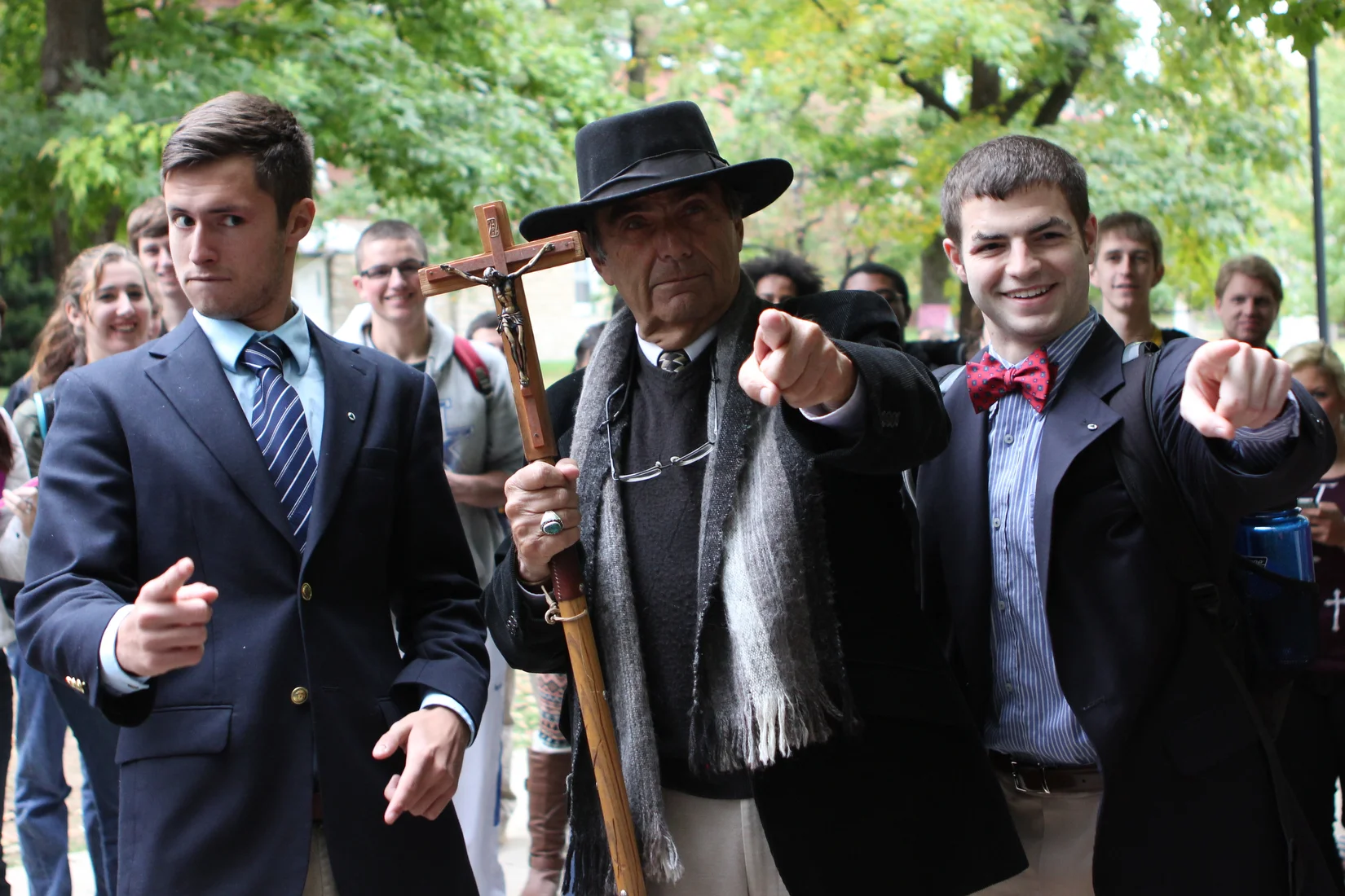  University of Kentucky students Darrell Banks (right) and Matt Matchinga pose with Brother Jed asking, "Are YOU saved?"&nbsp; 