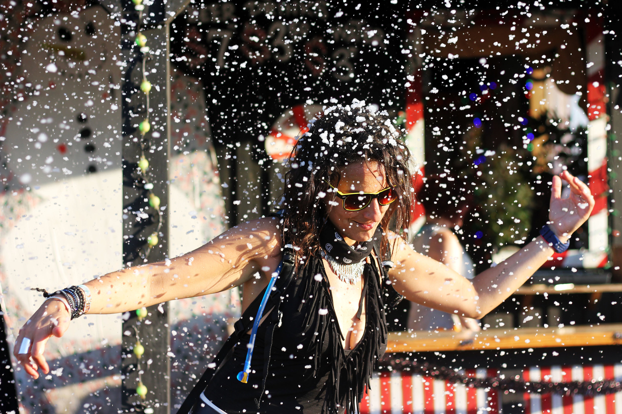  Jen Rosen dances in fake snow and 100-degree heat at the Christmas Barn at Bonnarroo Music and Arts Festival in Manchester, Tenn. Minutes later, she ran to a stage where the Chvrches were playing. She danced there, too. June 12, 2016. 