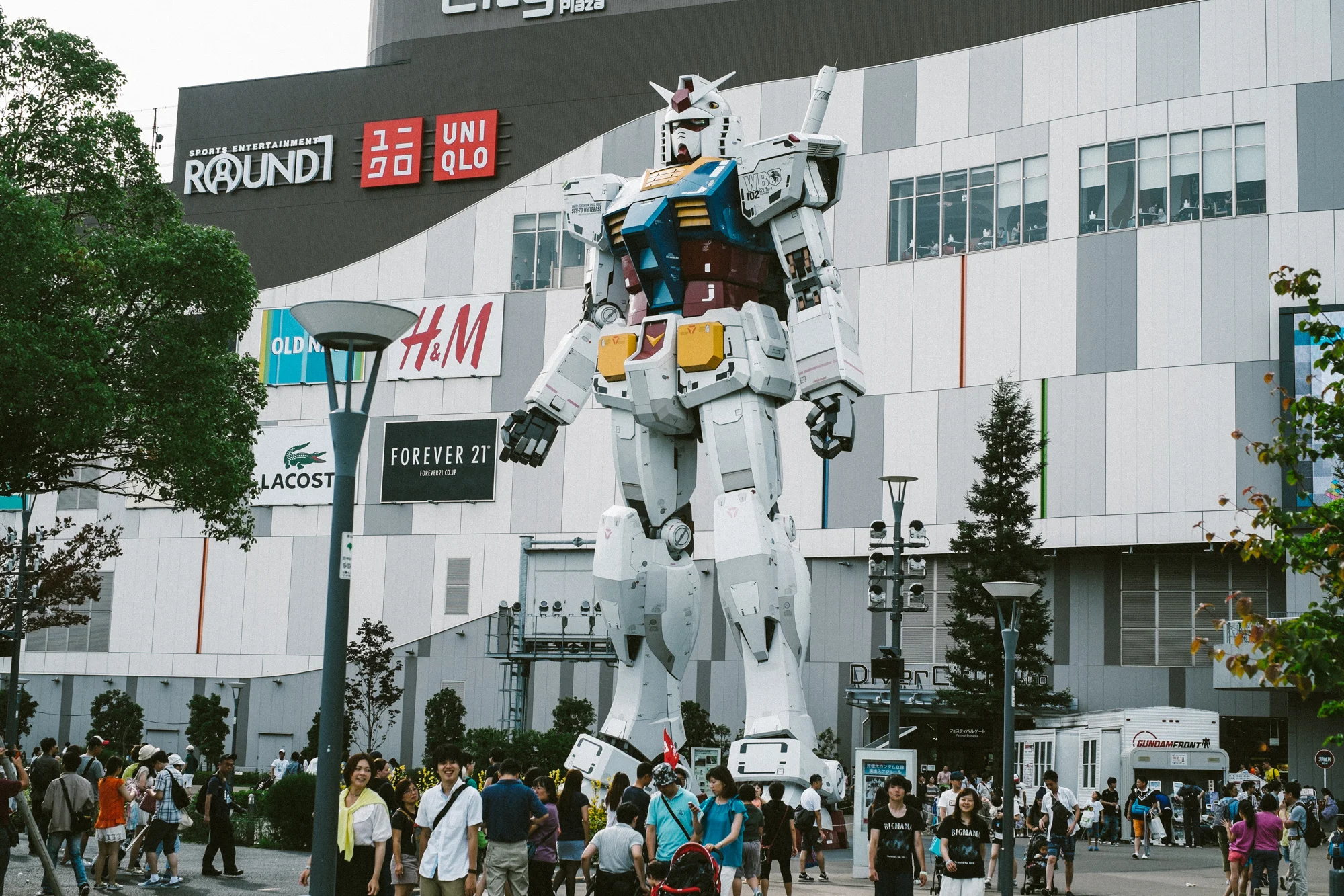 A giant Gundam patrols Odaiba.