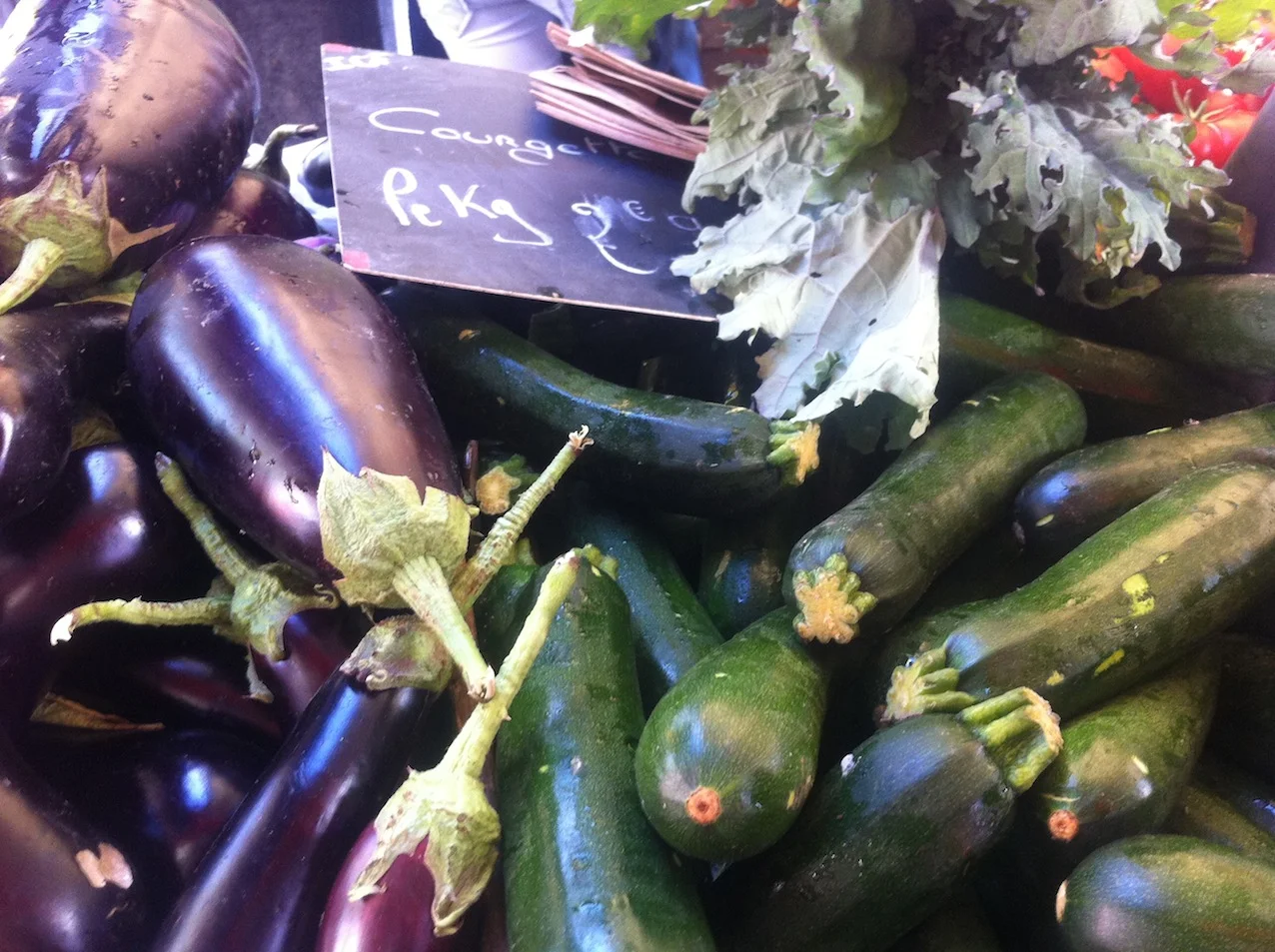 Eggplant, zucchini, and kale at Jean-Michel's stand, Marché Ornano 75018