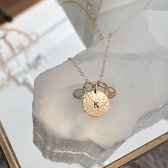 No one can steal her peace. 
Personalized necklace featuring mini peace symbol, hammered Lynn disc and mini quartz gemstone suspended from dainty, delicate gold chain. ☮️ | bohindi.co
