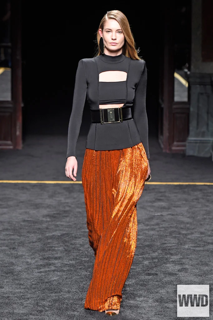 wwd:				Balmain RTW Fall 2015 Photo by Giovanni GiannoniBackstage before his Balmain show, Olivier Rousteing spoke about “what happened [in January],” referring obviously to the Charlie Hebdo 
shootings. He noted the importance of celebrating Paris’…