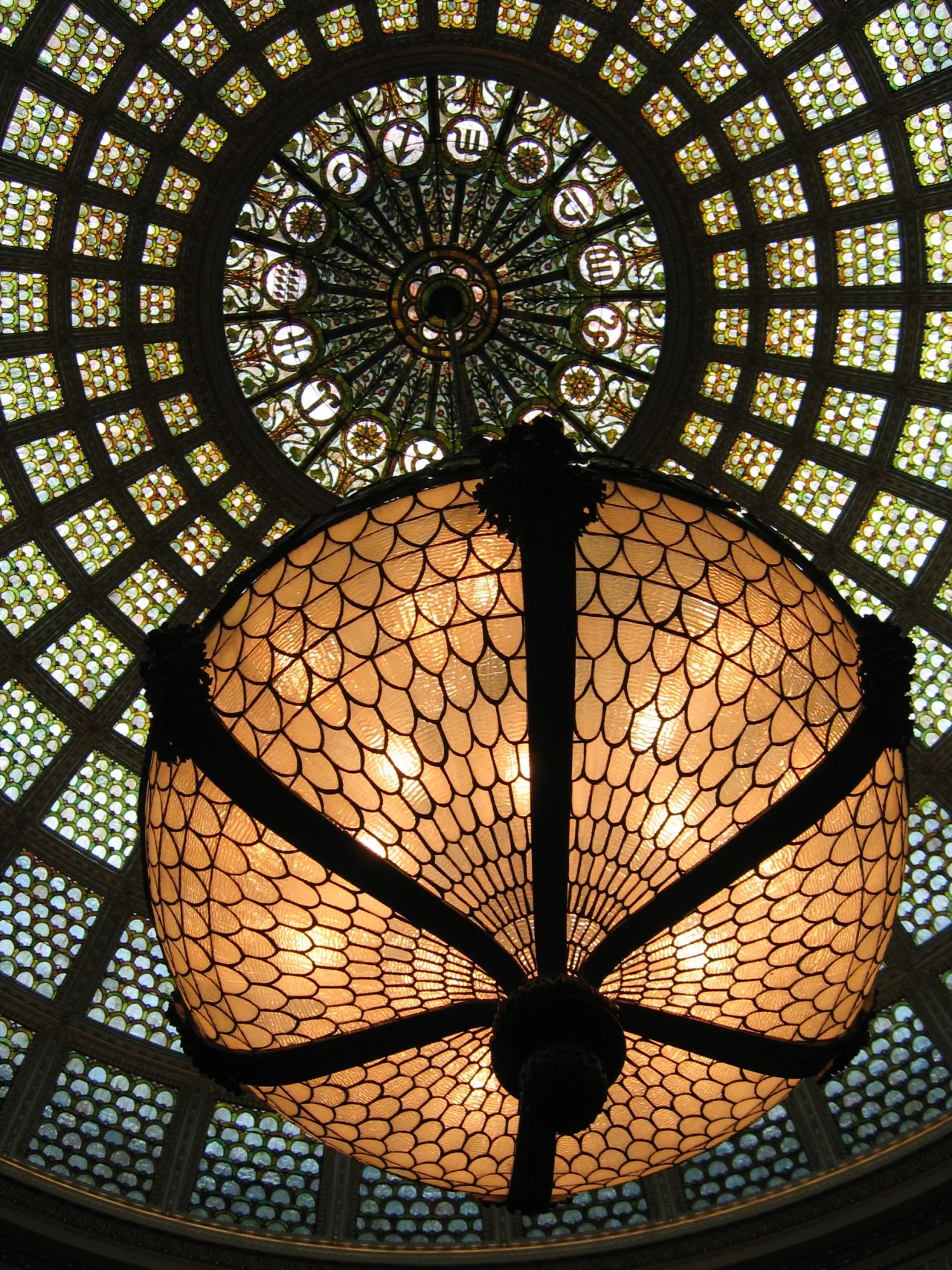 grandmilodon:

Tiffany chandelier and dome - Chicago Cultural Center. A masterpiece of American decorative arts (photo M. Ferrer).