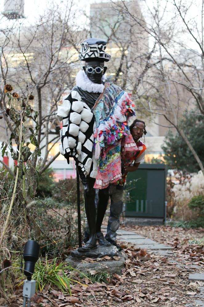 humansofnewyork:

Wendell is hands down the greatest homeless fashion designer who ever lived. He makes almost all his clothes from things he finds. I hadn’t seen him in awhile, so I was quite thrilled to walk up on him Tuesday, doing this to a Gand…