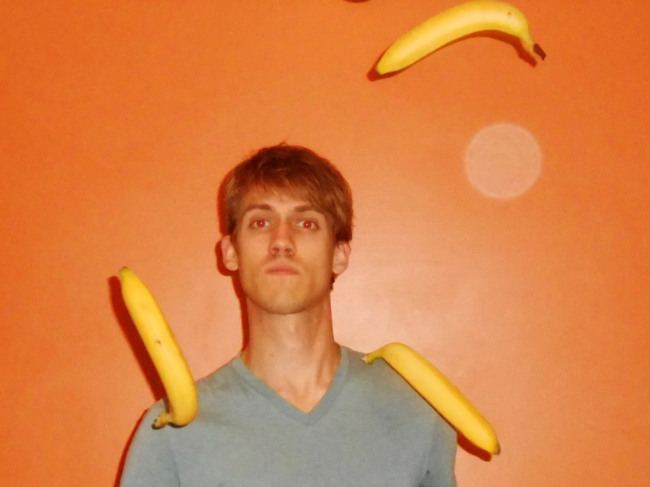 thejogging:

I didn’t believe orbs were anything but dust reflecting light until this one threw three bananas into the frame while I was taking this selfie, 2013Occurrence ***