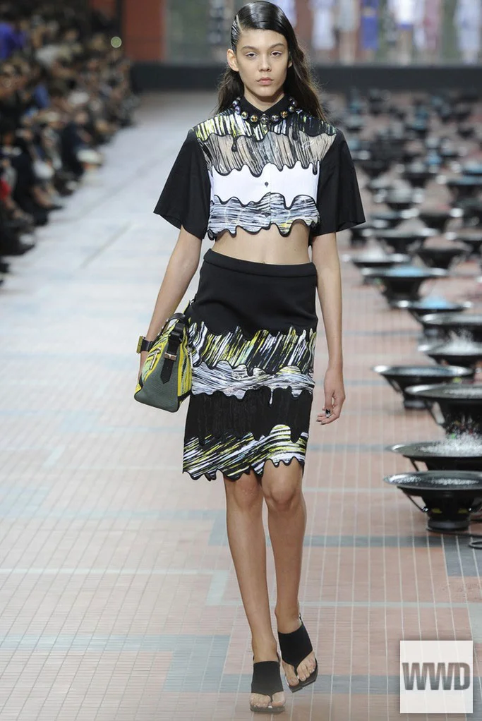 womensweardaily:

Kenzo RTW Spring 2014
Photo by Giovanni Giannoni
There was plethora of aquatic references: rain prints and fish motifs — the novelty-print replacement for last season’s evil eyes.  For More
For all WWD.com’s RTW Spring 2014 coverag…