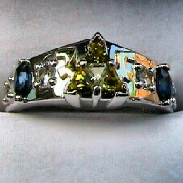 manatel:

Day 10: I want this ring! #Zelda #photoadayaug #ring (Taken with Instagram)

yes except change out the all blue stones for a blue, a red, and a green
also&hellip; I just fainted