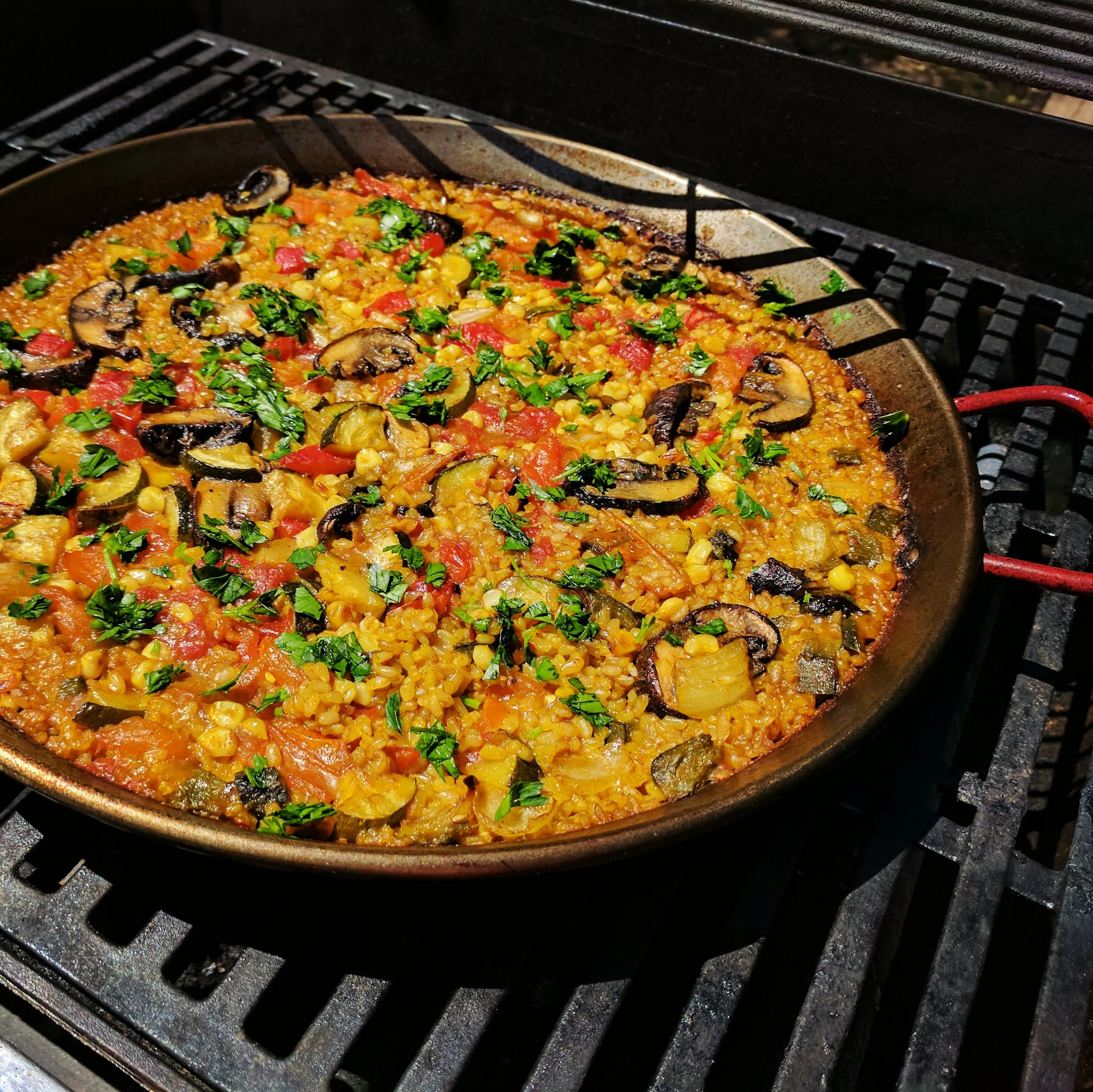 Cast-iron skillets, paella pans, and other high-heat pans can go directly on the grill. Make sure your pan is oven-safe and be sure not to touch the handles without oven mitts.