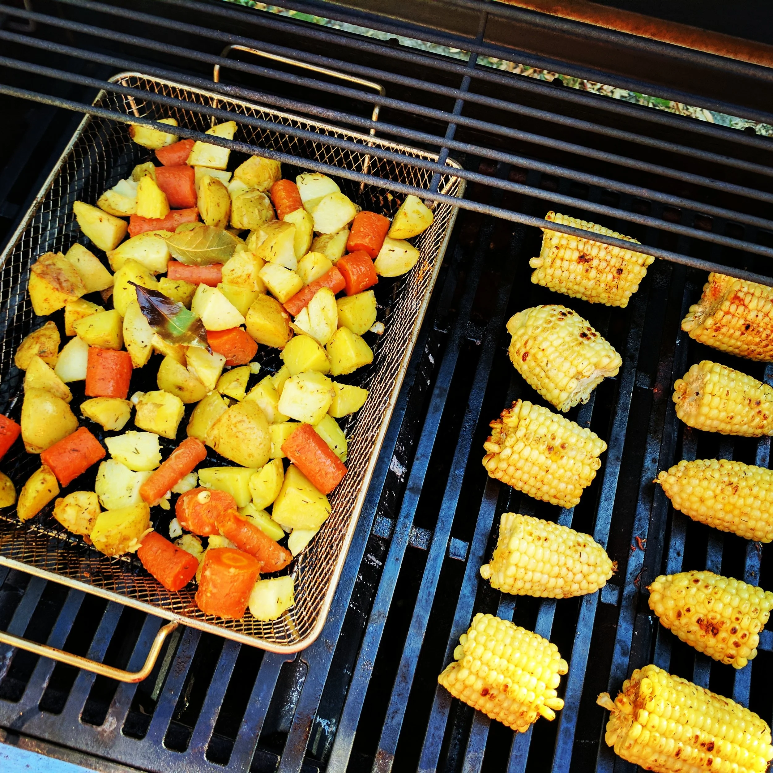 A grill basket works well for chopped vegetables and functions like a roasting pan in an oven.