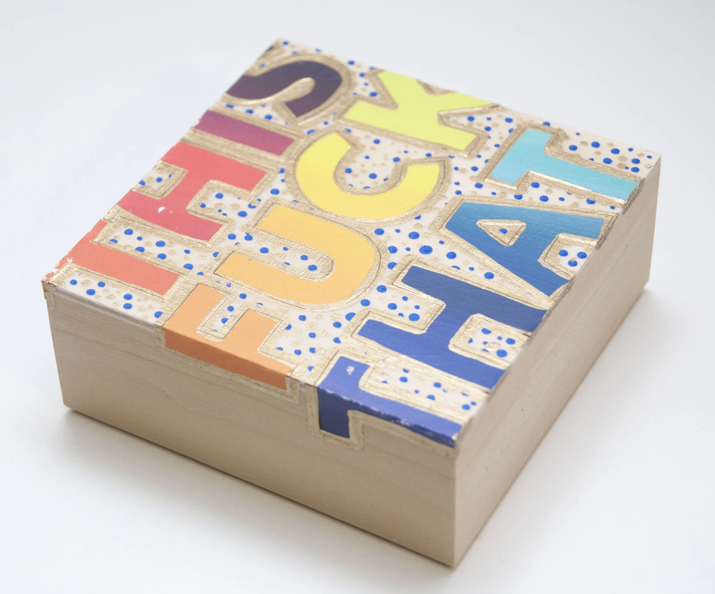 F*ck This, F*ck That , 2016 Acrylic, enamel, and catalog pages on wood 4 x 4 x 1 5/8 inches