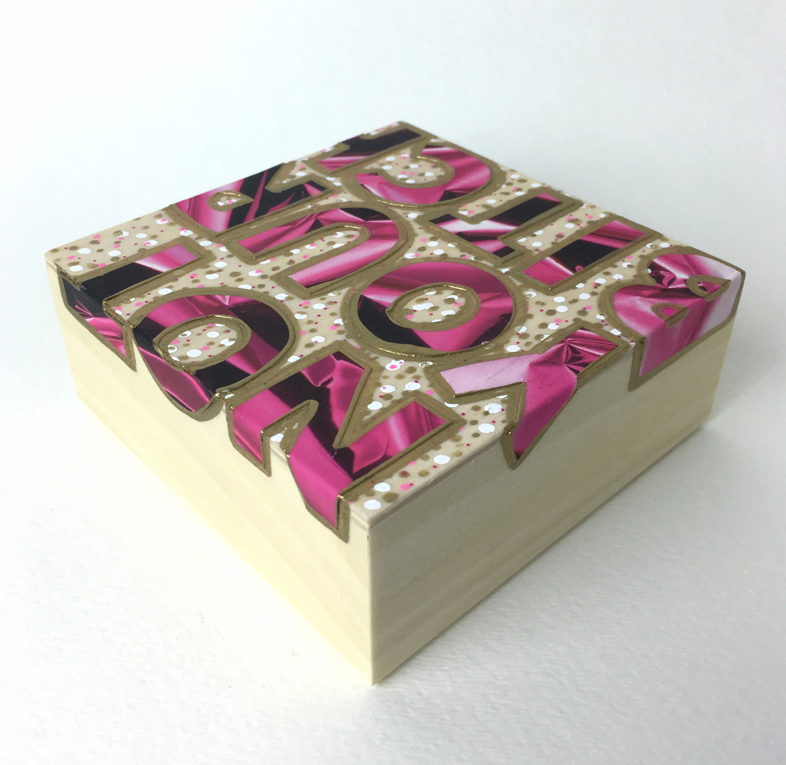 Not Your Bitch , 2016 Acrylic, enamel, and catalog pages on wood 4 x 4 x 1 5/8 inches