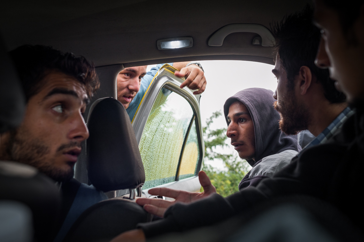Negotiating with a Macedonian taxi driver. Since Germany suspended the Dublin treaty in late August 2015, and no-one needs to fear being finger-printed elsewhere anymore, there have buses, dinghies, taxis, trains, and ferries shuttling the large numbers of refugees and migrants along. Oct 8, 2015.