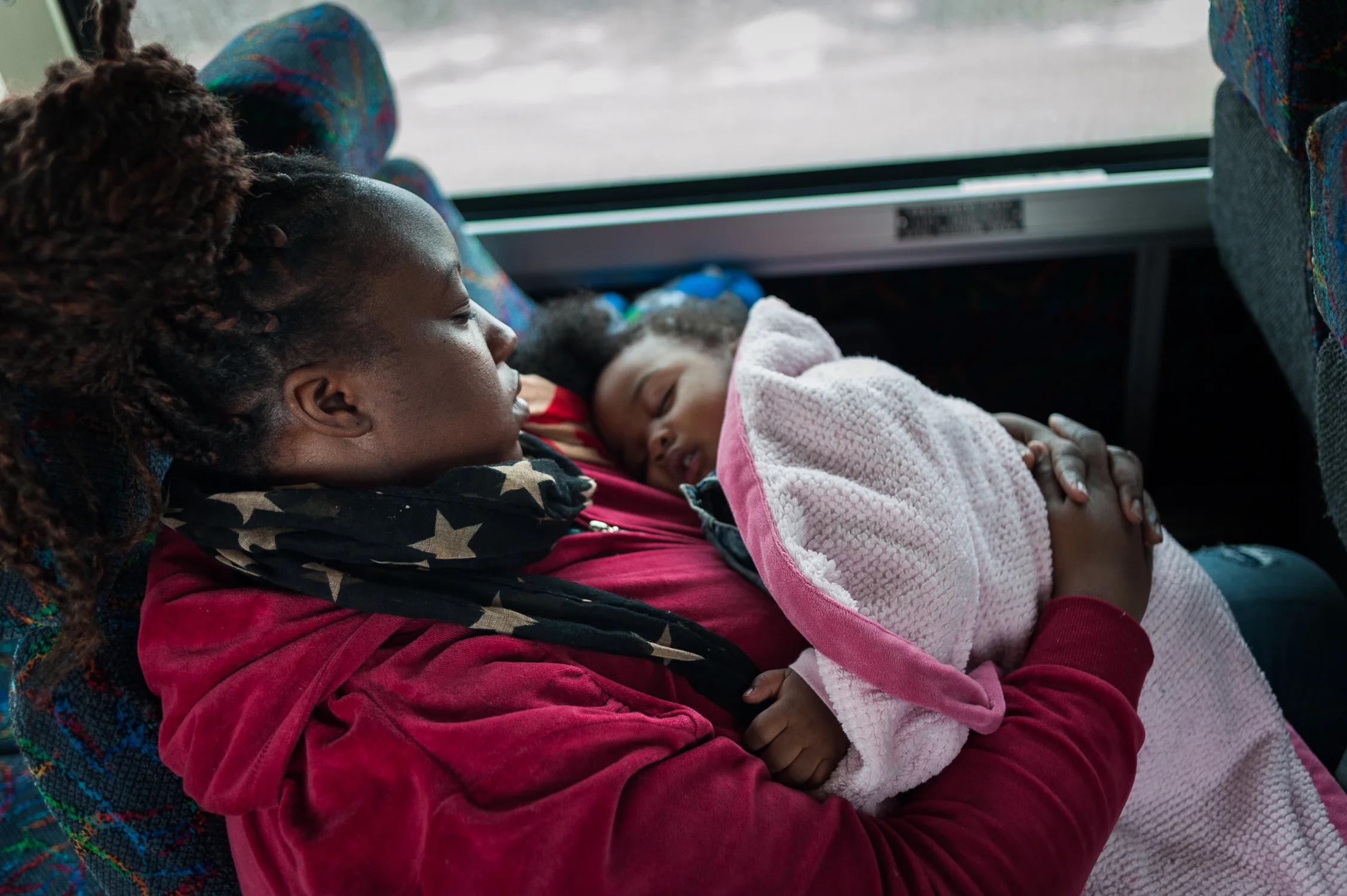 Candis, 31, and her daughter Camryn, 1, on the way home from visiting John, Camryn's father, at the Wyoming Correctional facility on this day trip. Camryn was conceived during a so called "trailer" visit, one of the weekend visits that exist at many maximum security prisons. March 15, 2014.