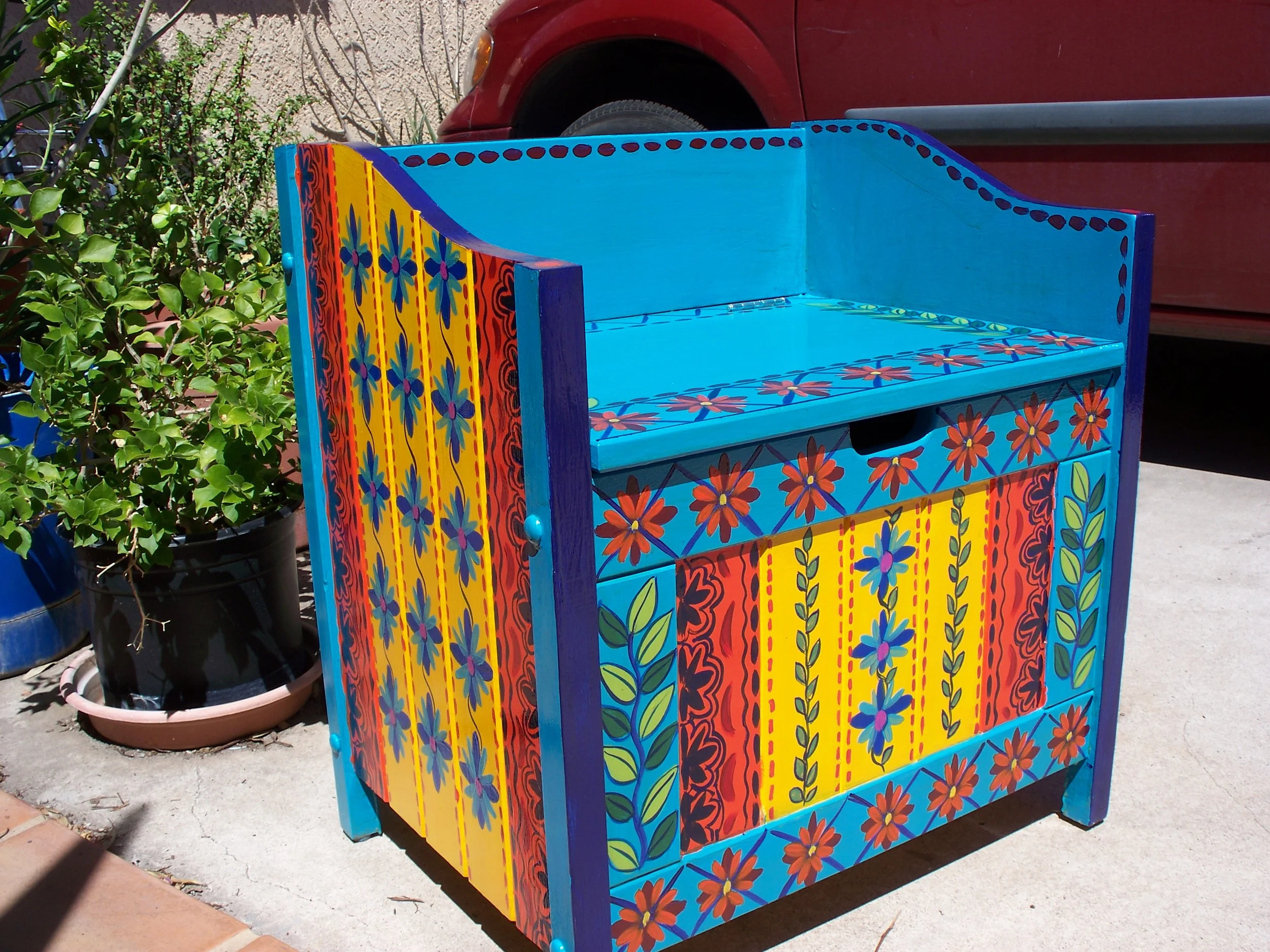  Chest-bench. In yellow and blue design, this piece provides both storage and seating. 