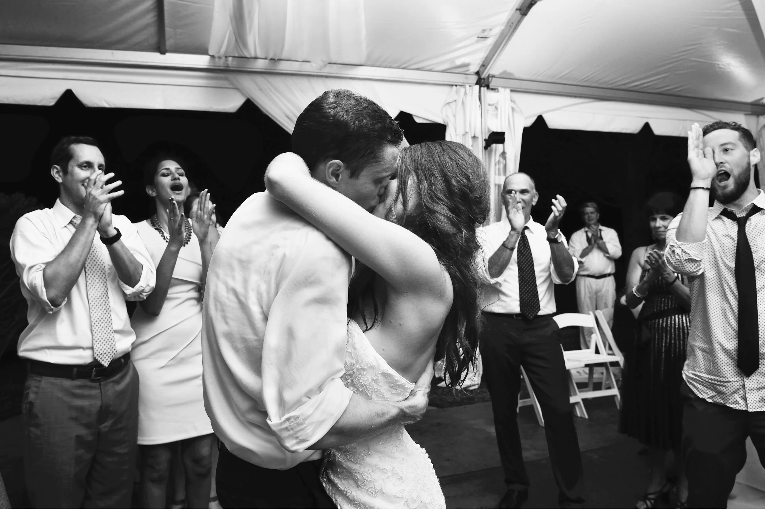 Bride and groom kiss during last dance at Eolia Mansion wedding reception