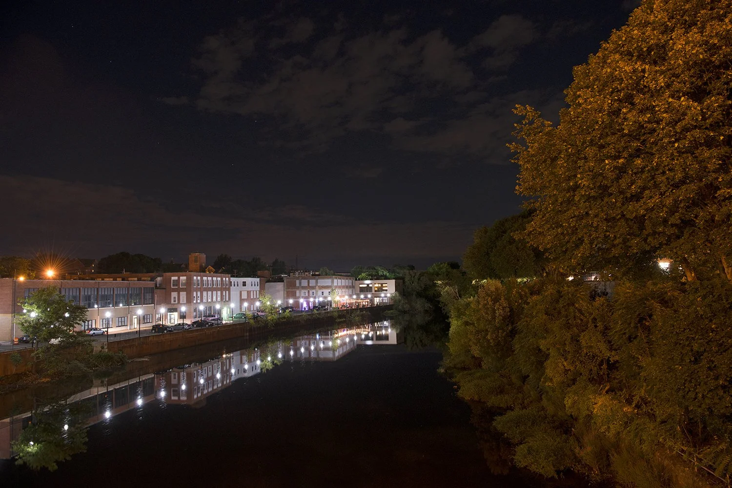 Revel Factory on Roosevelt Ave at night from Exchange Street bridge in downtown Pawtucket, RI