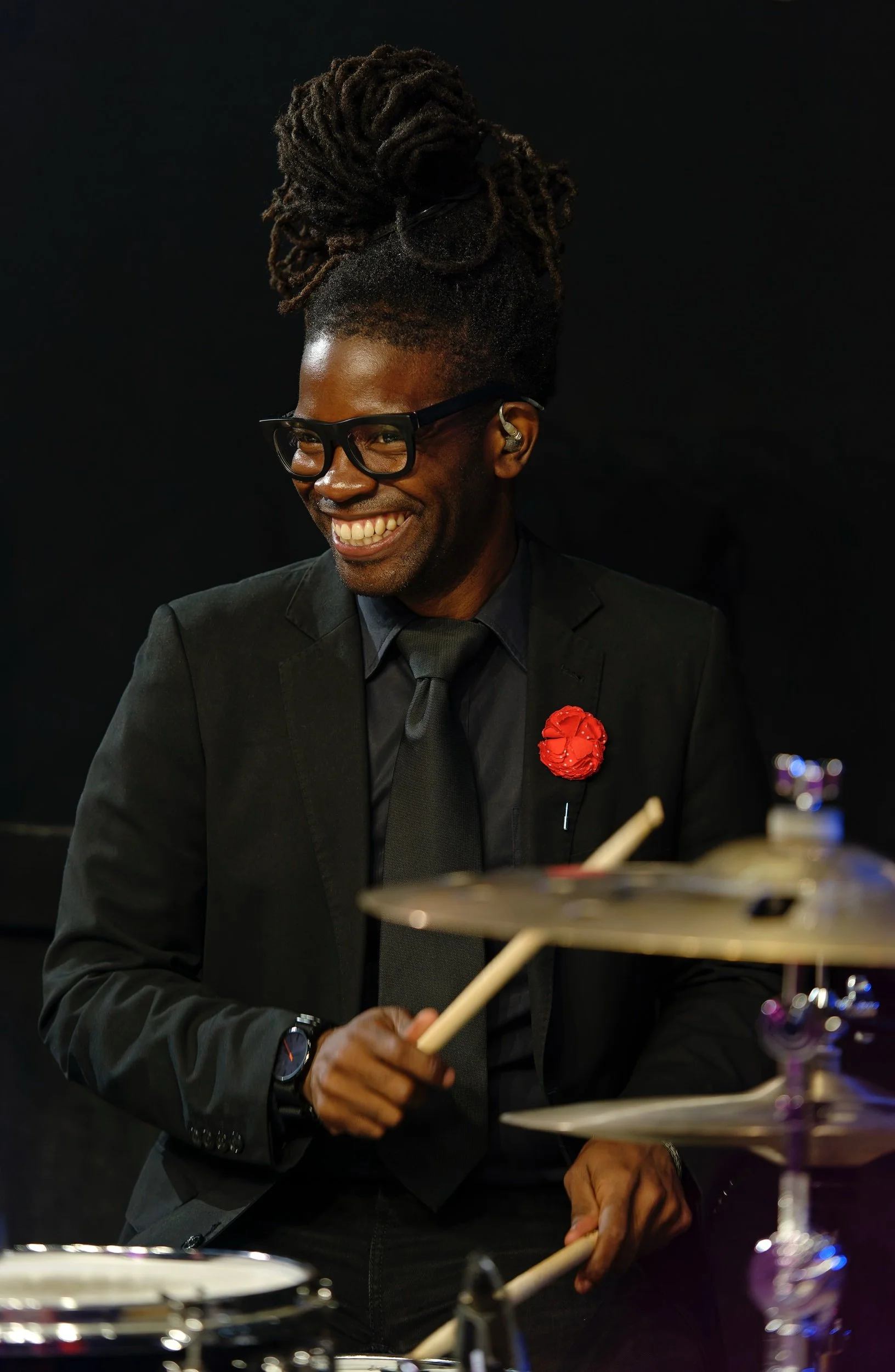 Color photograph of drummer during UMANI music video production at SIR Music Studio in New York City for Hank Agency Group.