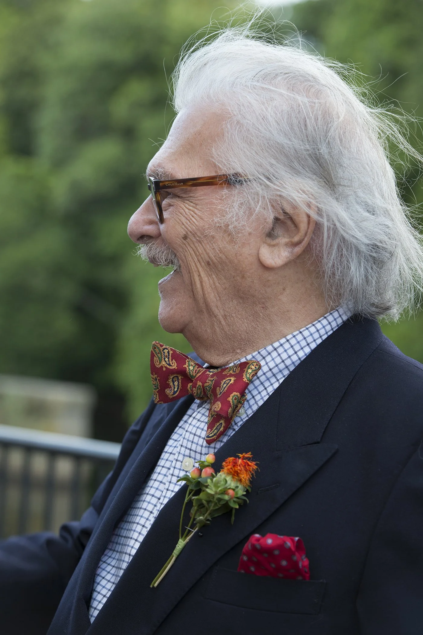 Candid moment of Morris Nathanson laughing at Dedication & lighting of the Exchange Street bridge, Pawtucket, RI