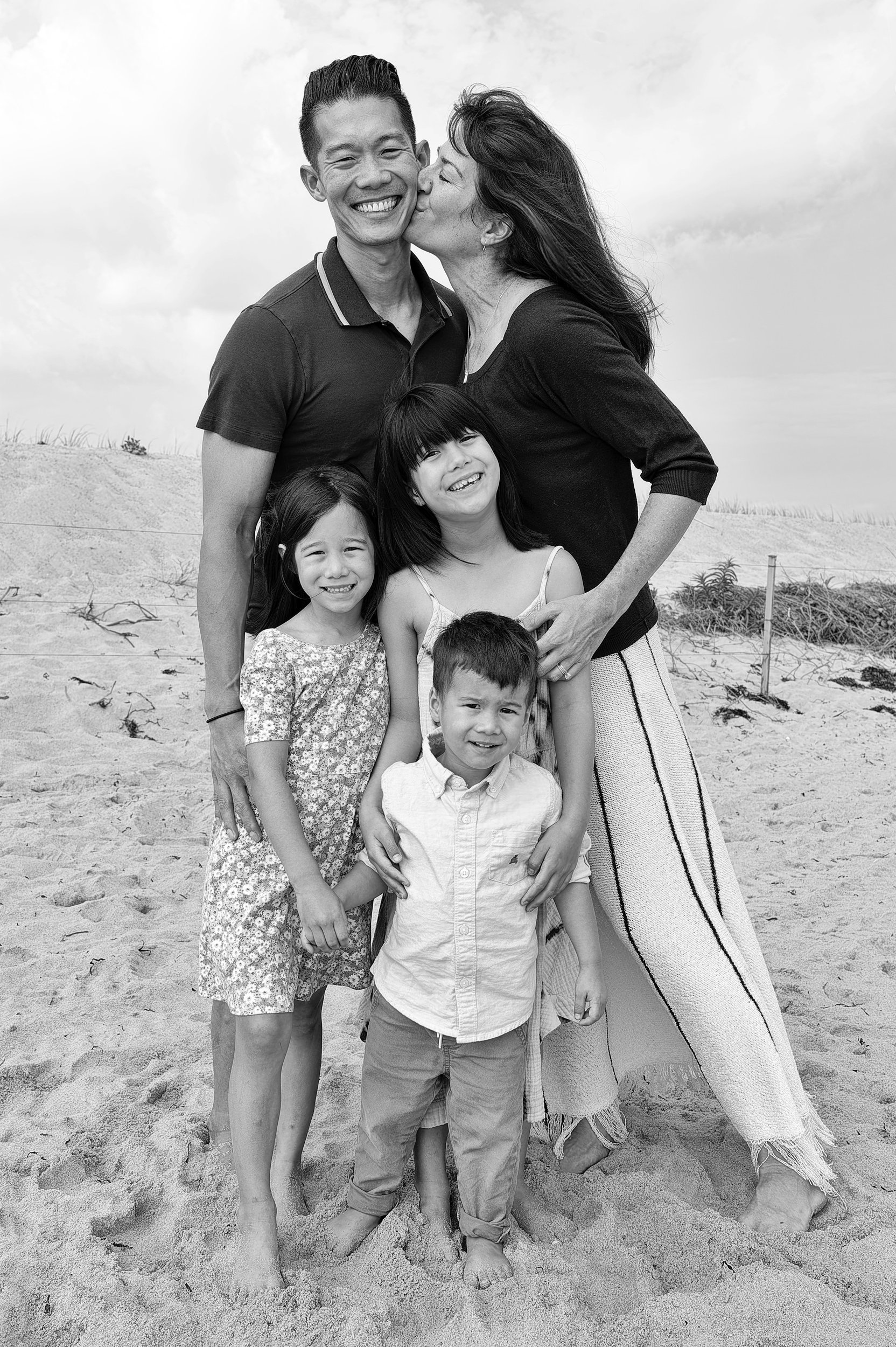Black and white family portrait on beach in Martha's Vineyard.