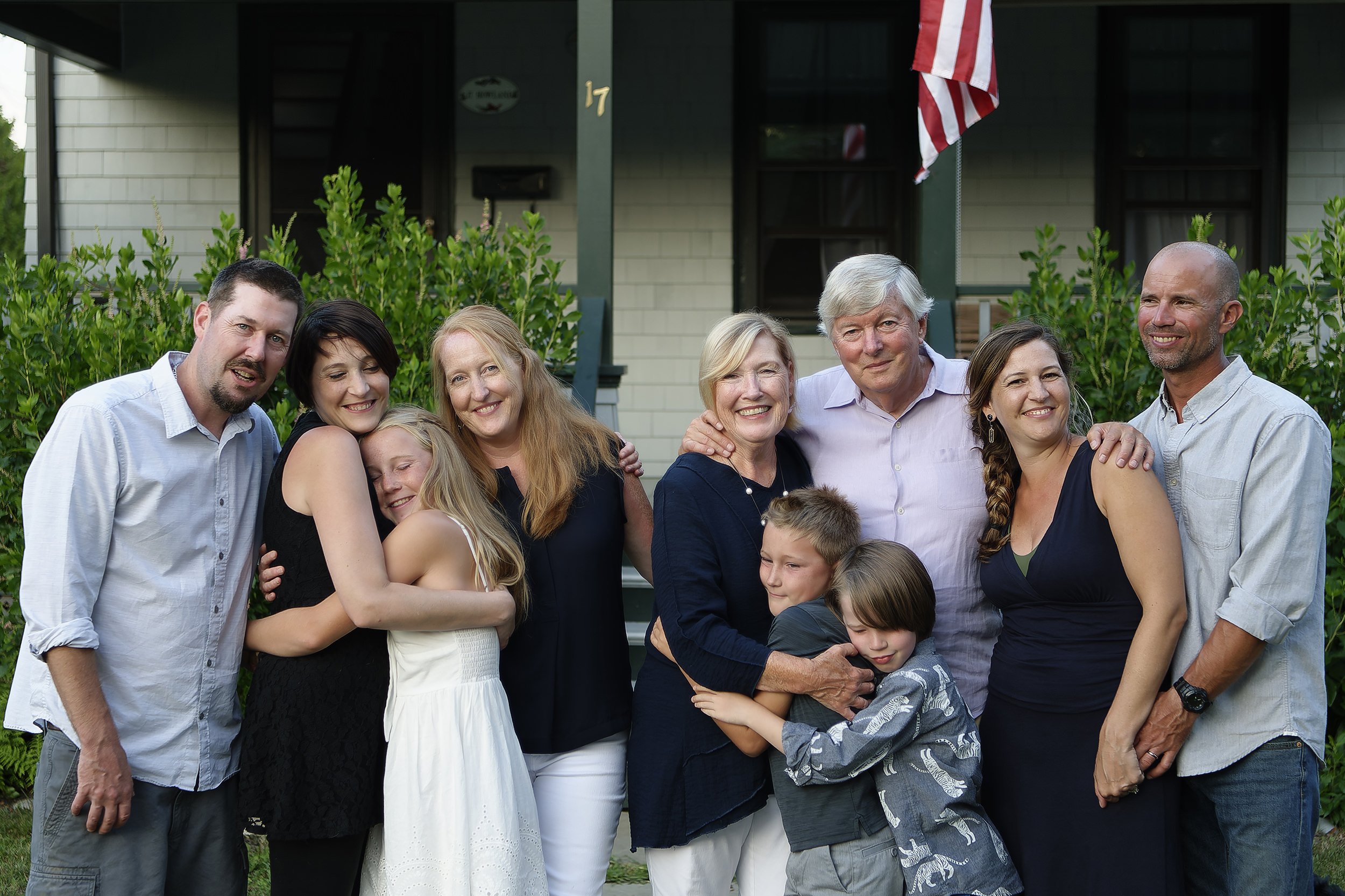 The extended family of 10 together in front of grandma and grandpa's house in Jamestown, RI