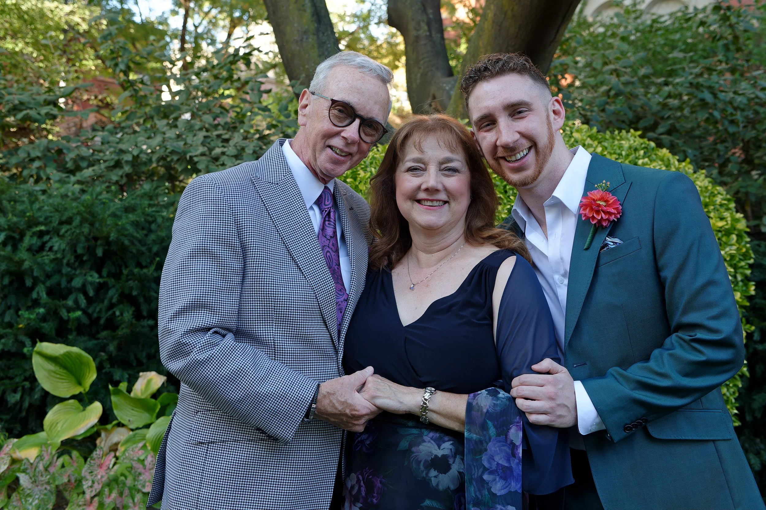 Portrait of Patrick with parents before the ceremony in New York City.