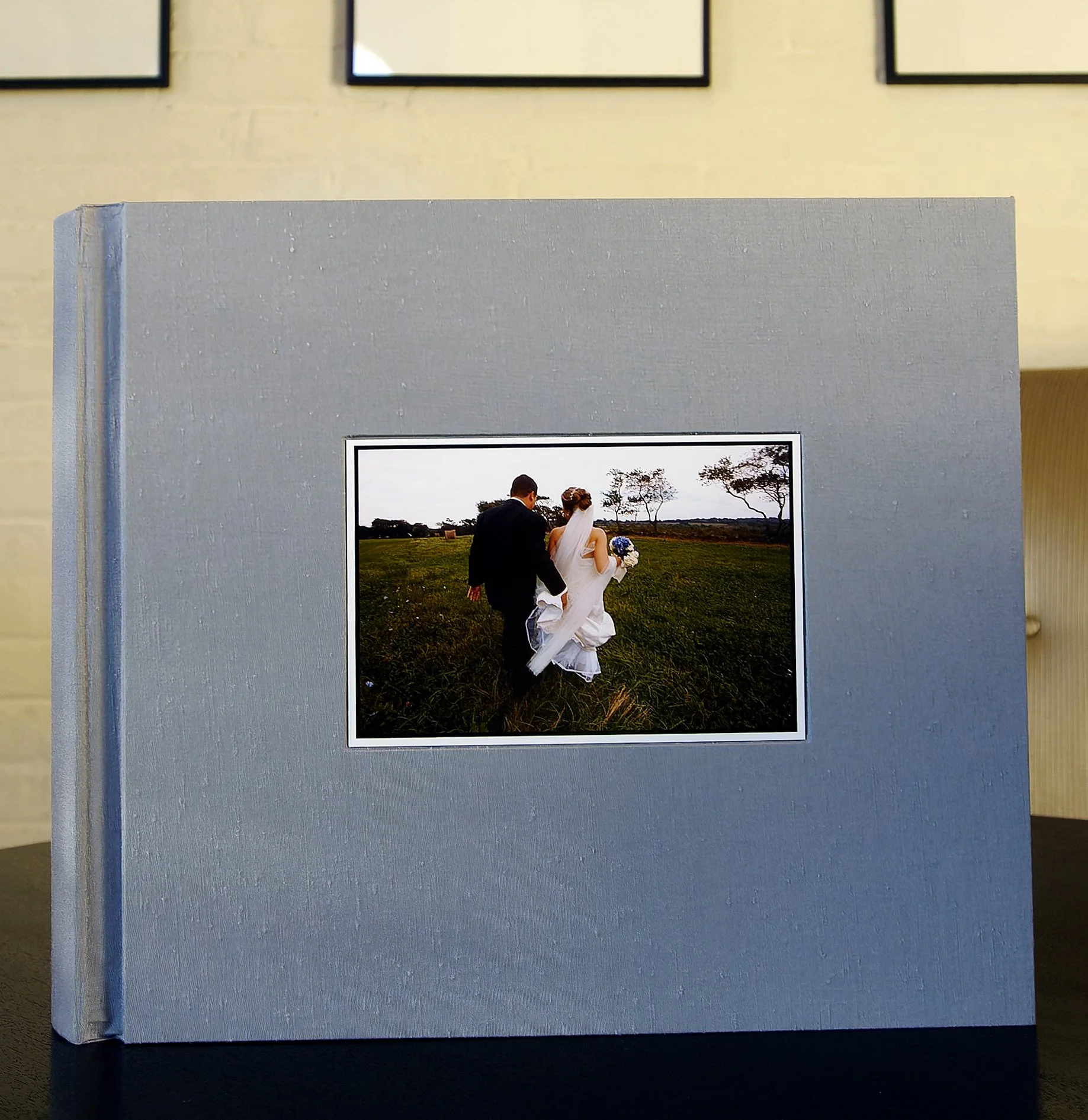 Blue santung silk album with inset photograph