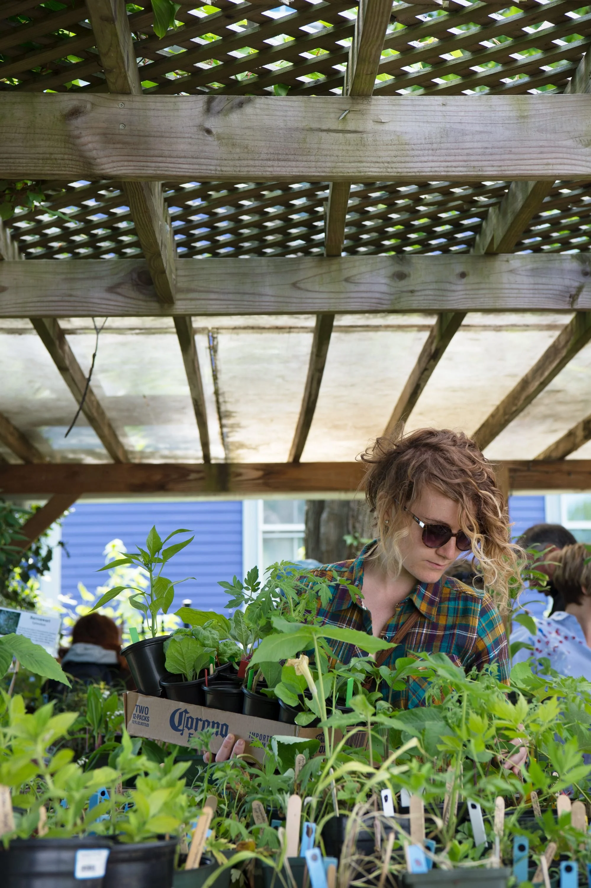 Volunteer enjoying the Southside Community Land Trust Annual Plant Sale.