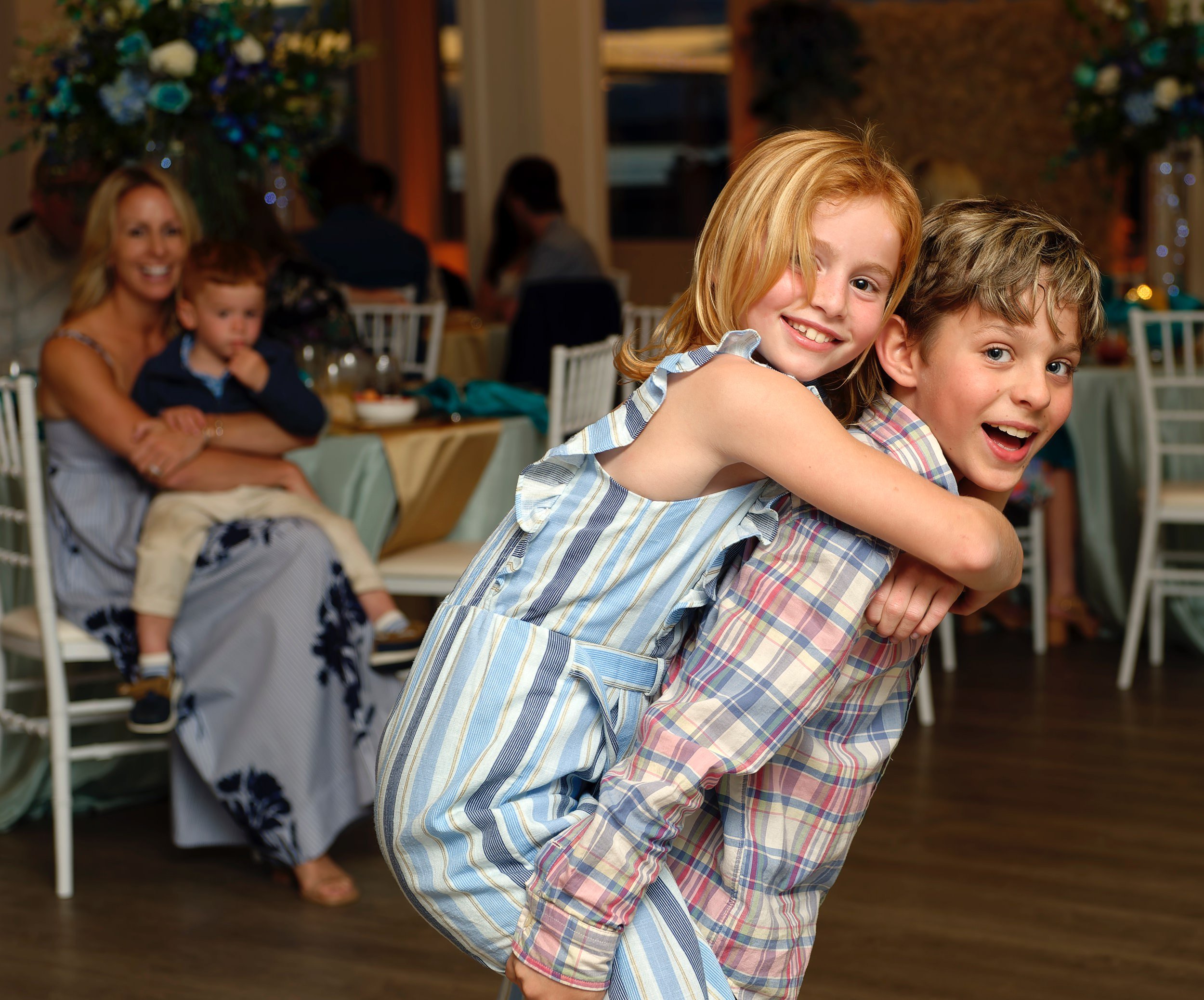 Children dancing together during Linda and Joe's anniversary celebration