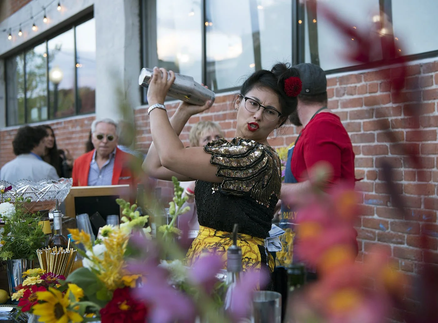 Bartender mixing drinks at Revel Factory event in Pawtucket, RI