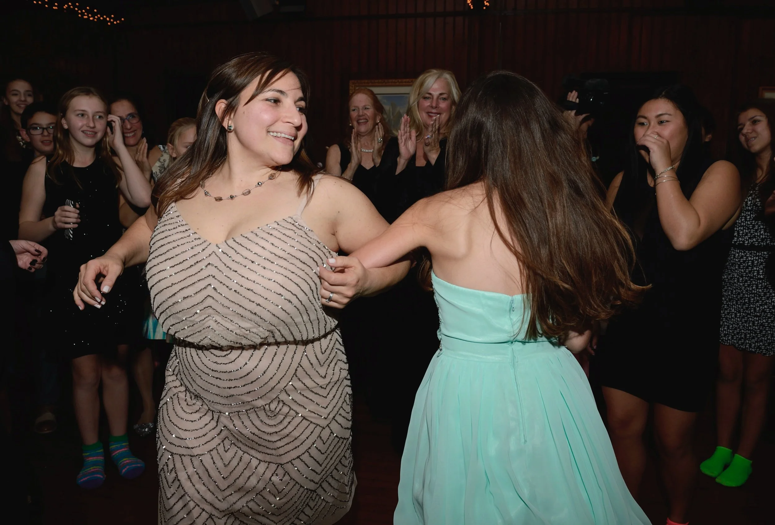 Maya dancing with mother during "Hava Nagila"