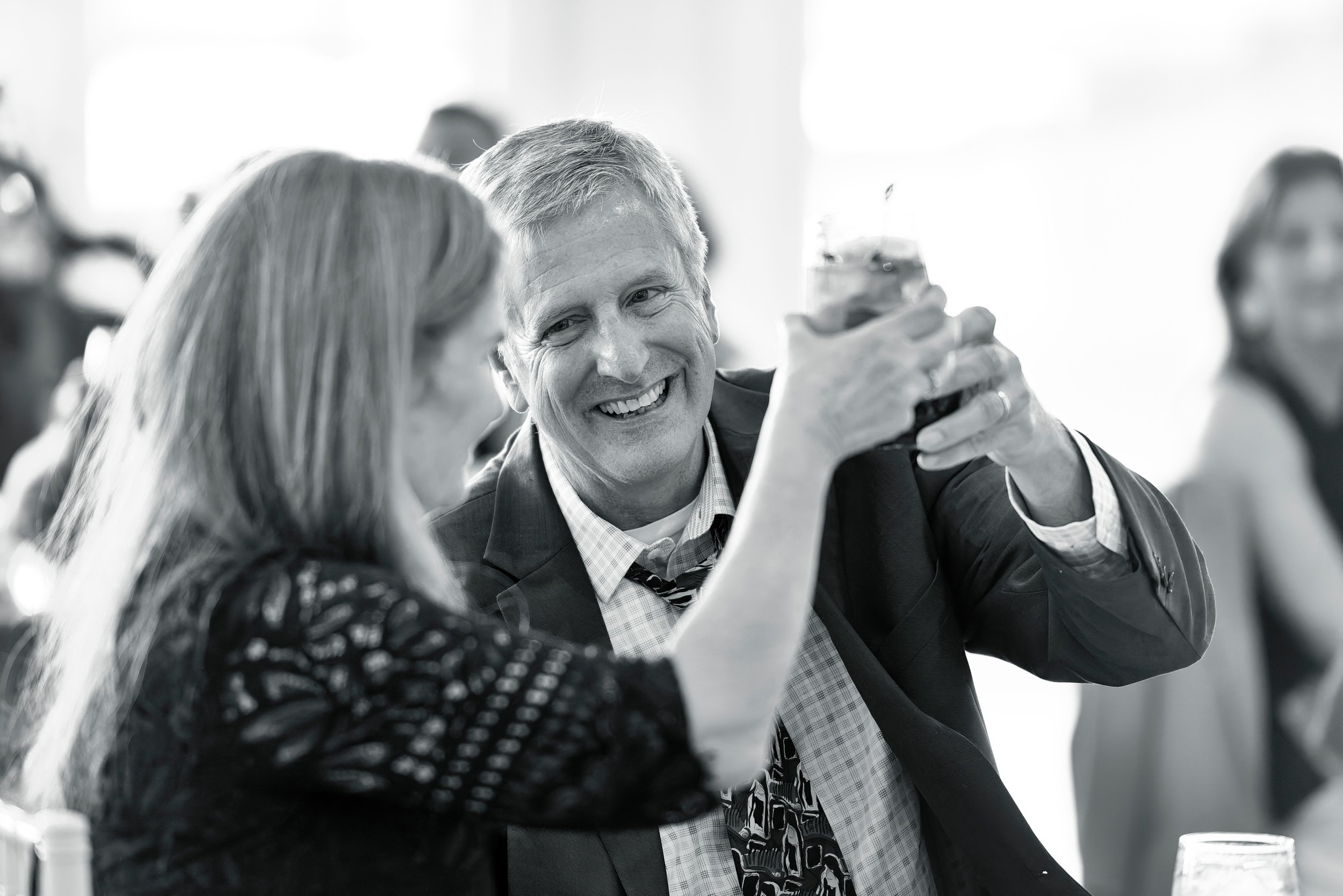 Linda and Joe toast during their anniversary celebration