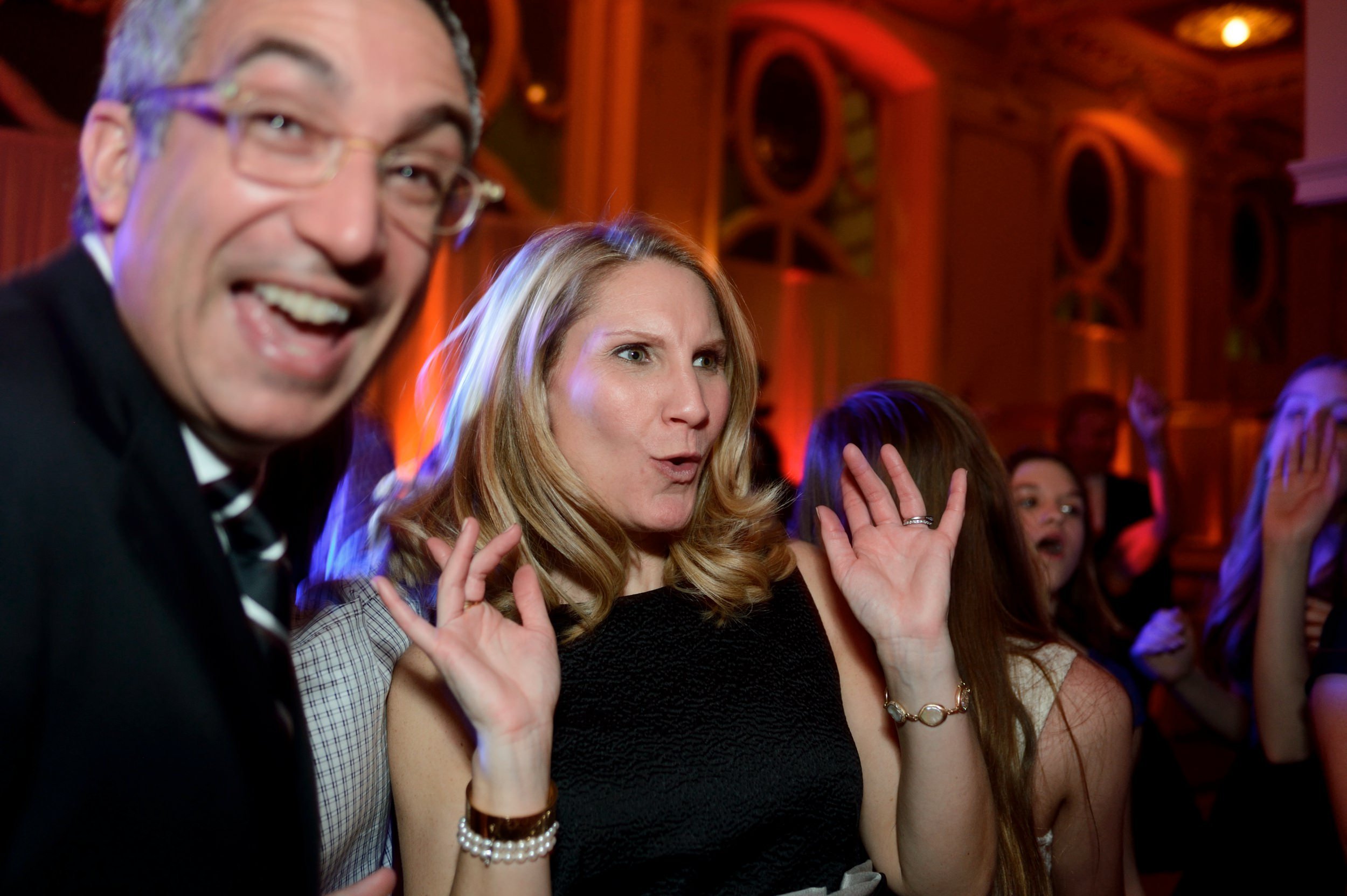 Mom and dad celebrating together on the dance floor