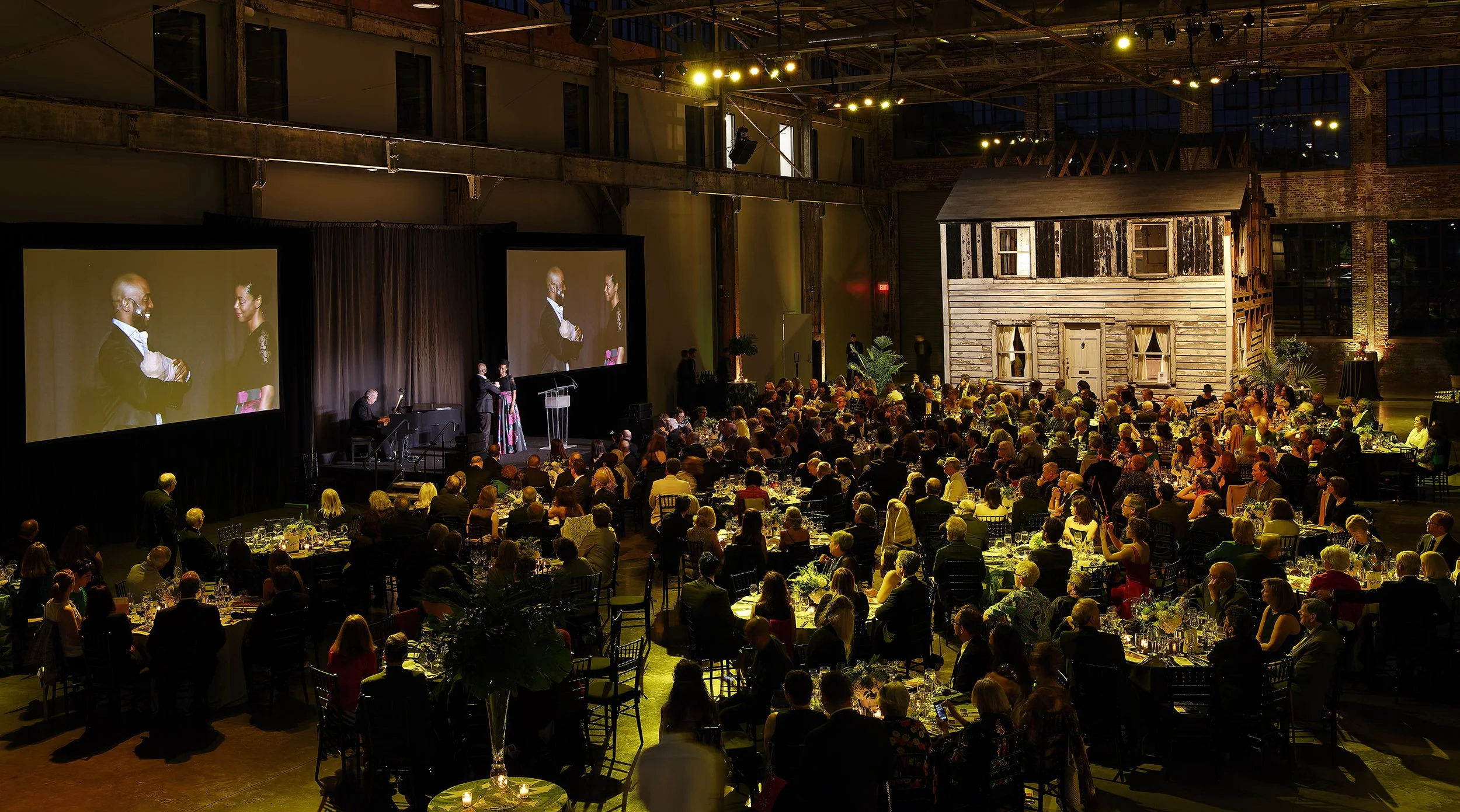 Wide-angle of guests from above during Pell Award ceremony at Waterfire Arts Center in Providence, RI.