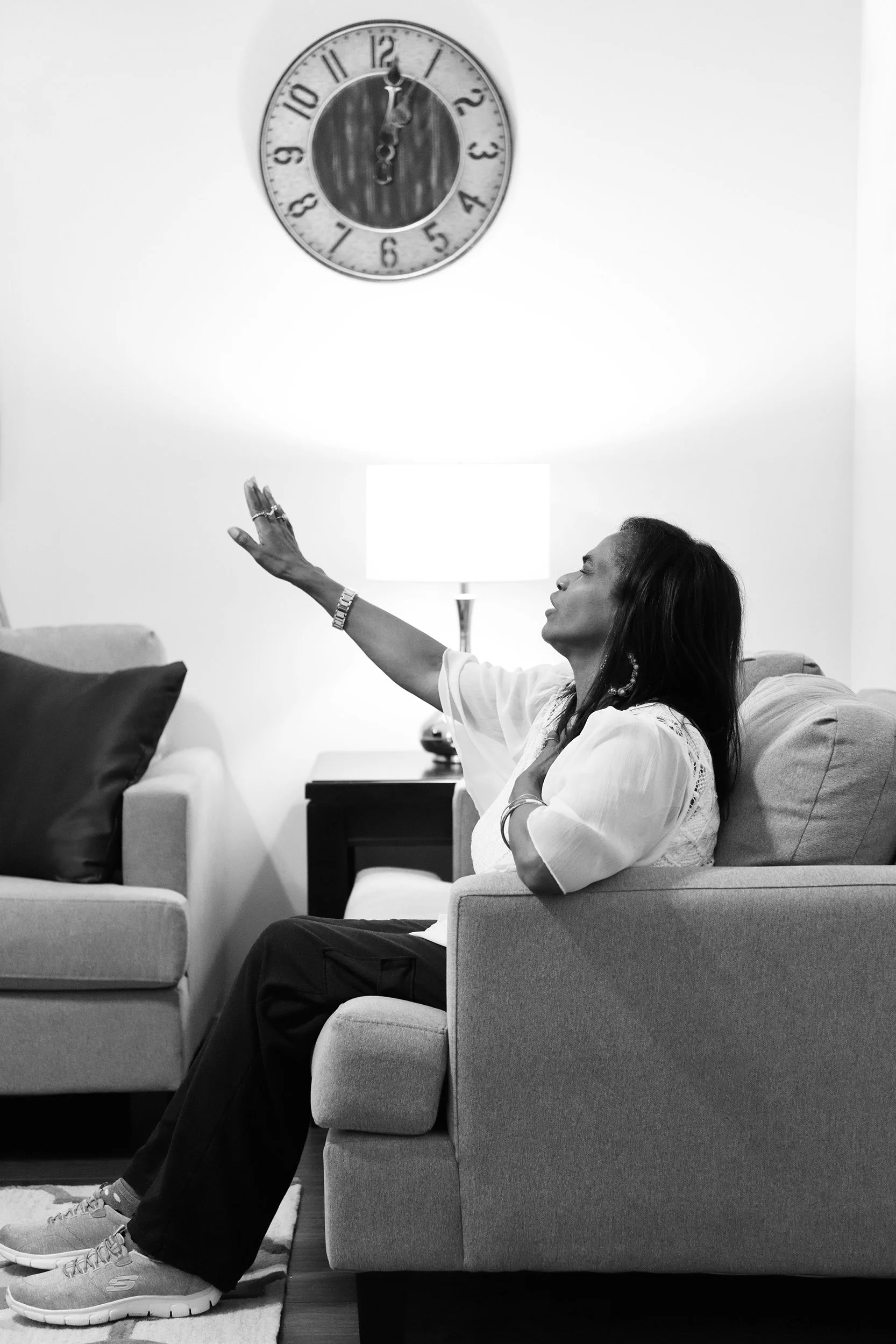 Woman praising Jesus in gratitude in New Orleans, LA